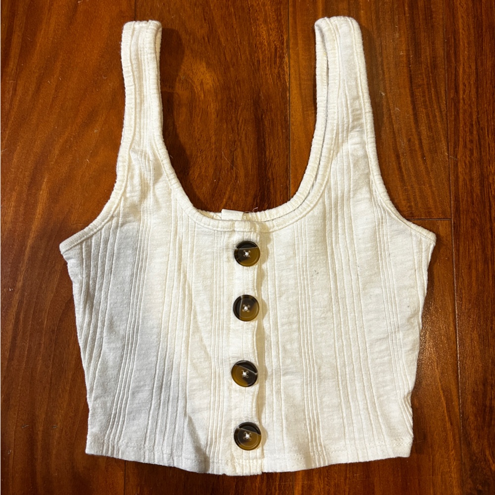 Button crop tank